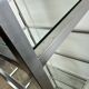 1980s stainless steel and glass bookcase shelf
