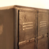 Industrial metal cloakroom with rounded corners.