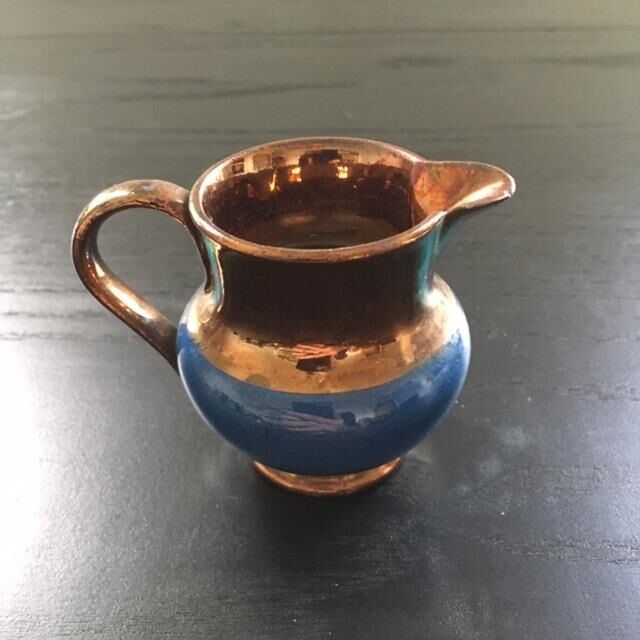 Two-tone copper and blue pitcher
