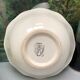 Round dish model embrun, with yellow floral patterns. stamped salins france