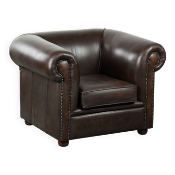 Luxury brown cow leather Chesterfield armchair with a timeless English look