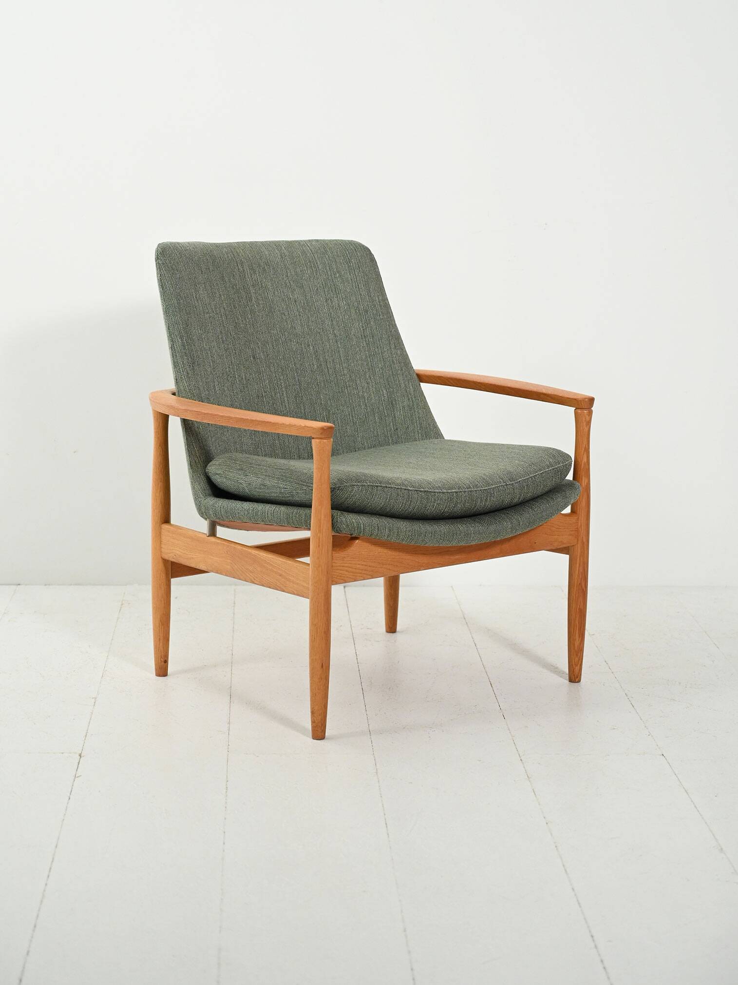 Scandinavian oak and sage-green wool armchair