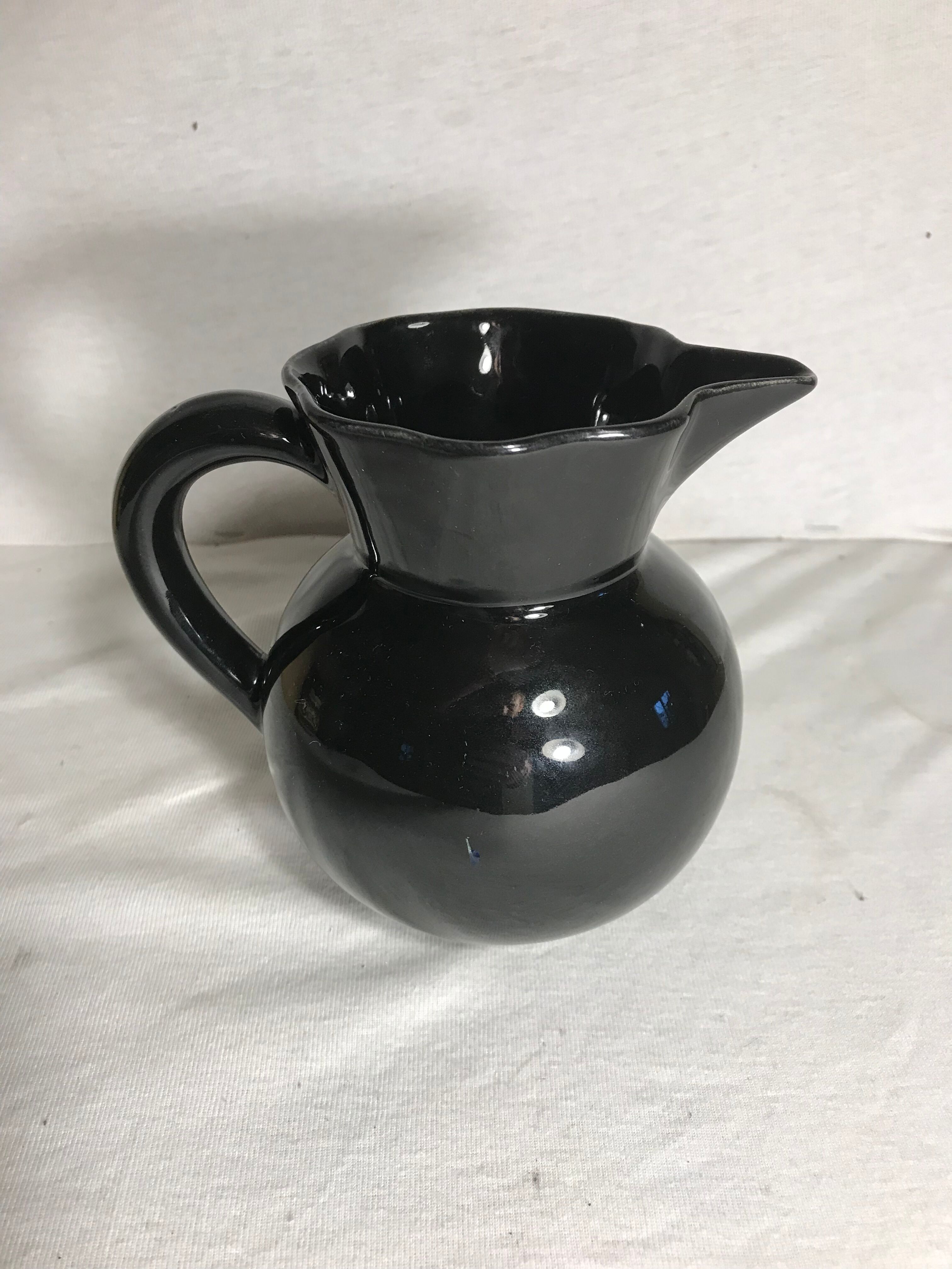 Former enamelled ceramic black pitcher 70s