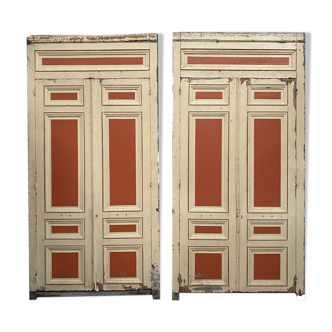 Pair of cupboard fronts with double doors molded in patinated wood 20th century