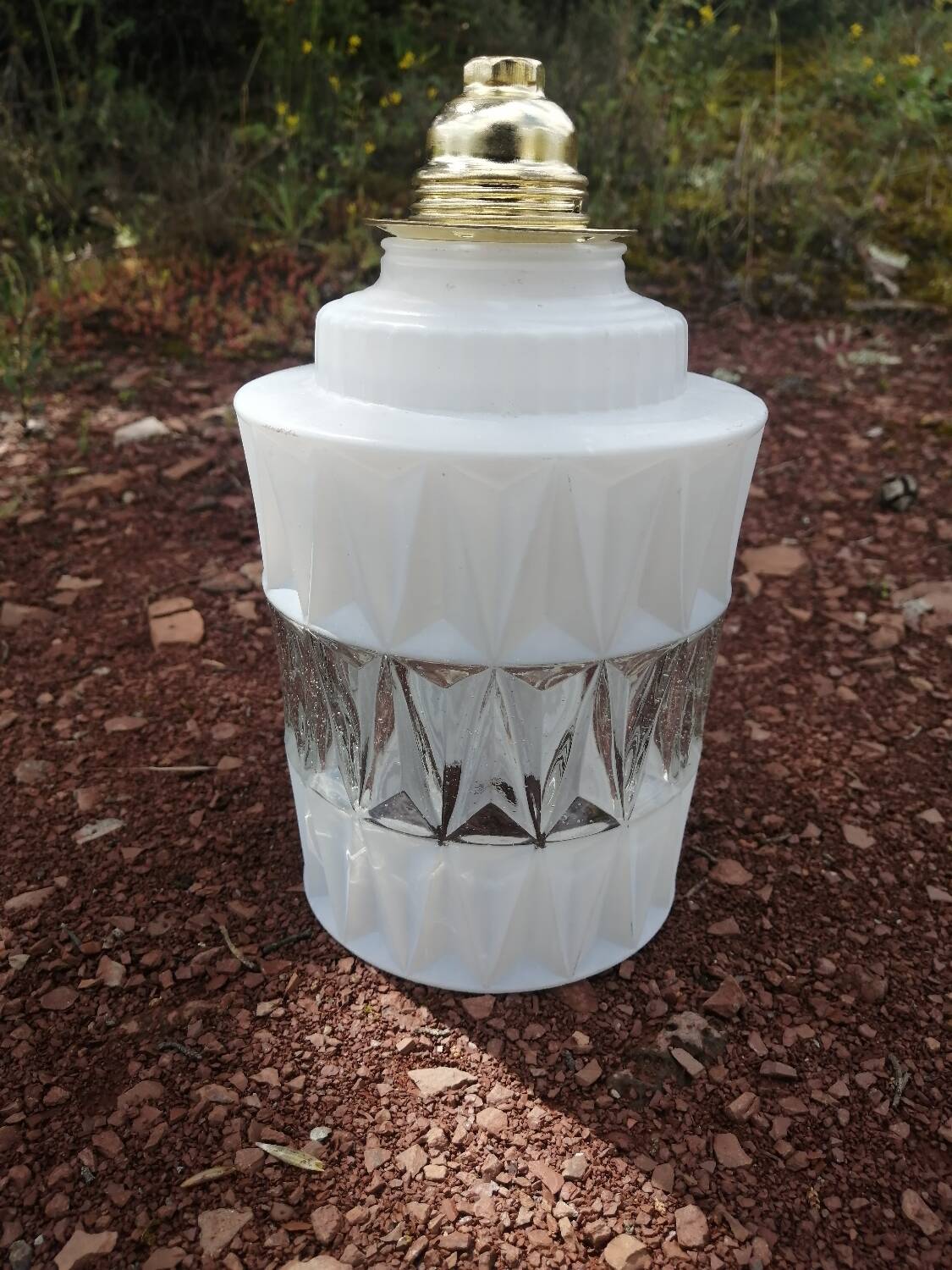 Vintage globe pendant light in molded glass.