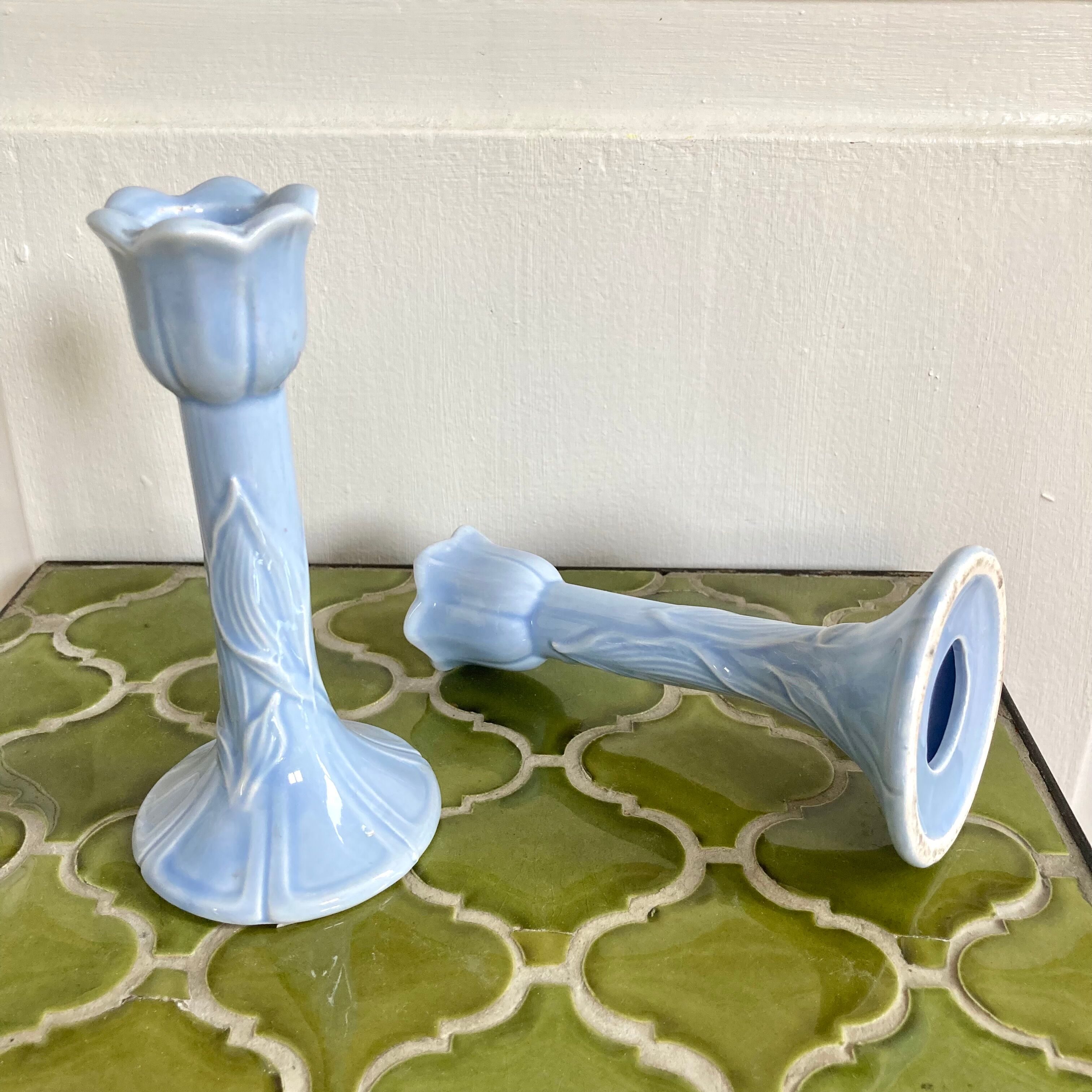 Pair of tulip candlesticks