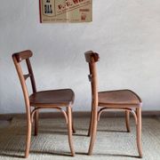 Pair of wooden bistro chairs signed Thonet, 1940s