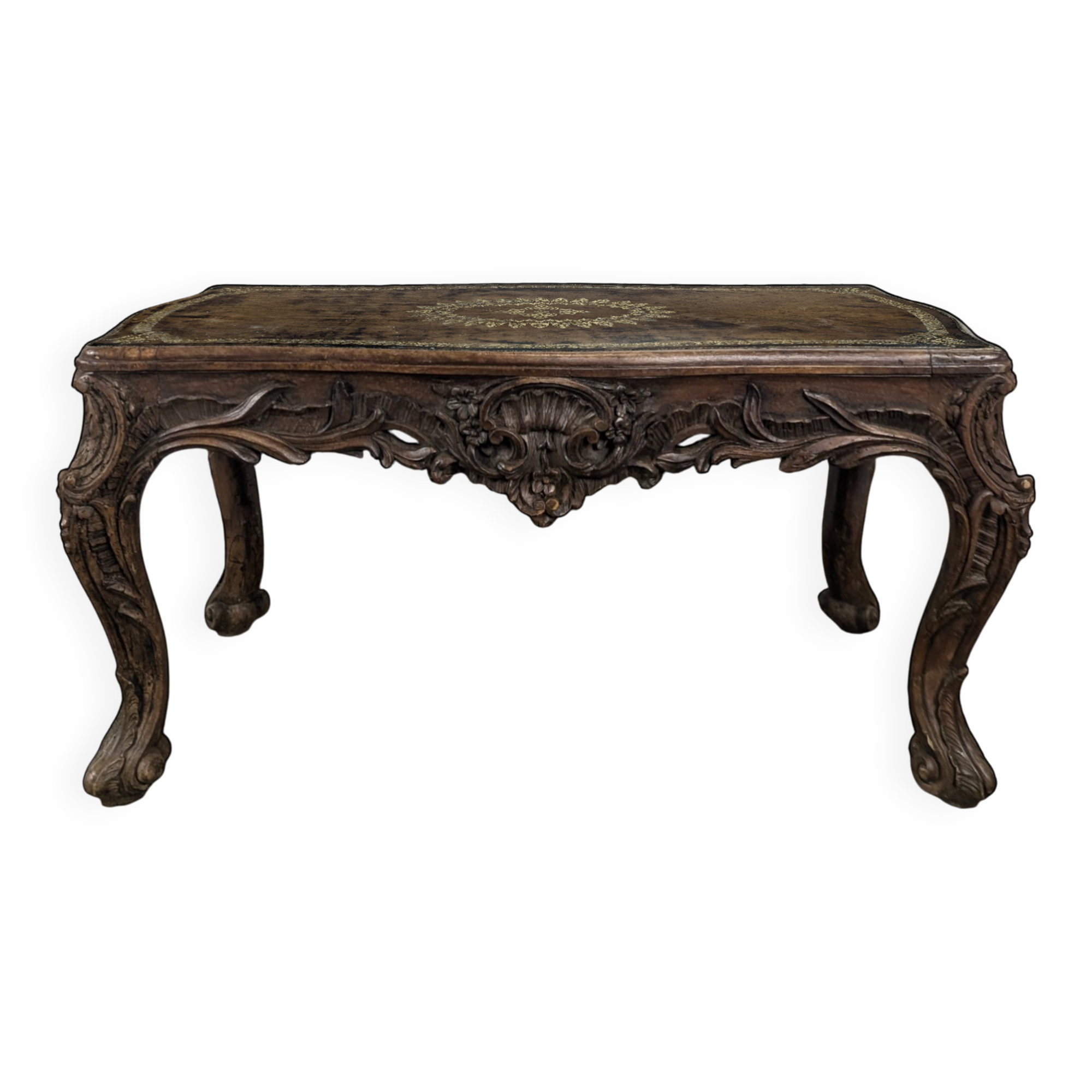 Louis XV coffee table in carved walnut with a gilded leather top.