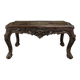 Louis XV coffee table in carved walnut with a gilded leather top.