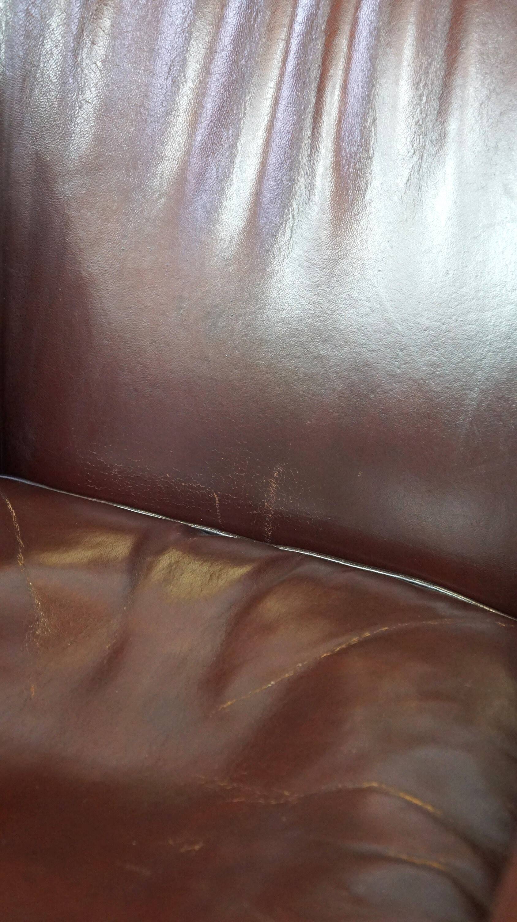 Nice sheepskin club chair with a beautiful patina