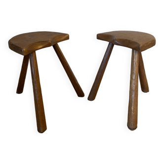 Pair of antique Brutalist solid wood stools