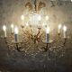 Chandelier 12 lamps with grapevines in crystal, bronze and regulated