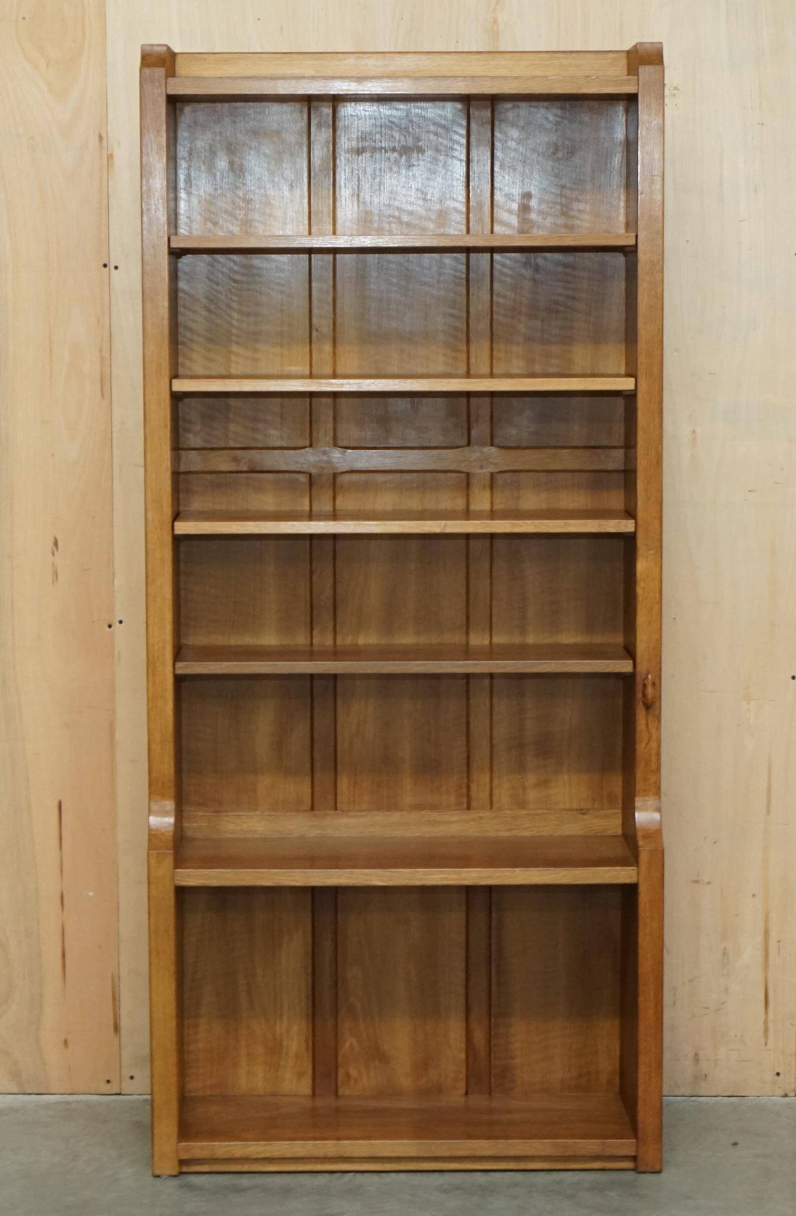 Pair of Robert Mouseman Thompson oak carved bookshelves.