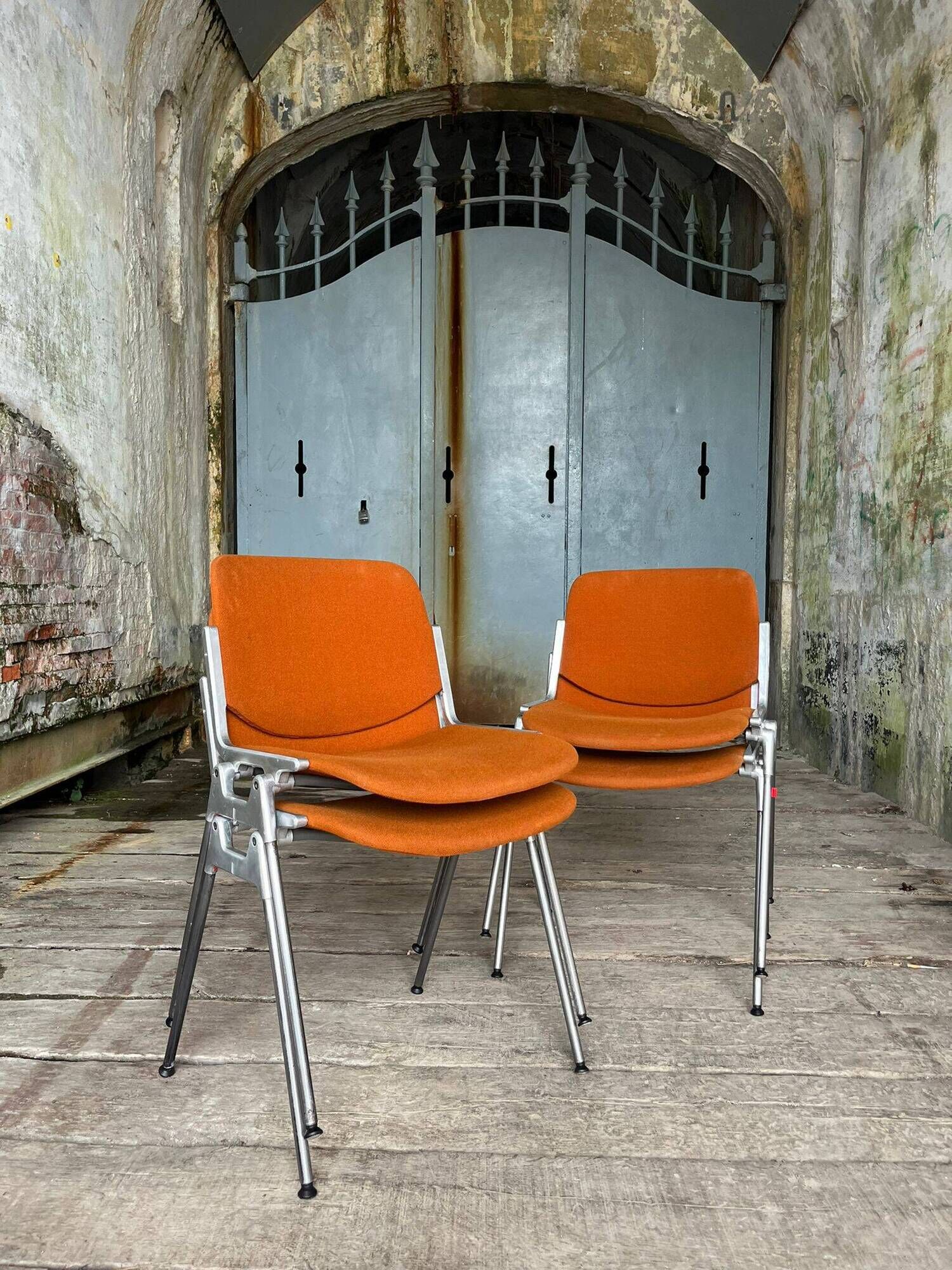 DSC 106 chair in orange by Giancarlo Piretti for Castelli, 1970s.