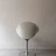 Ero swivel armchair in metal and white shell, p. starck design for kartell