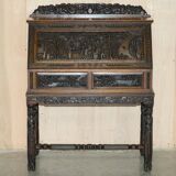 Chinese hand-carved desk from around 1940 with matching chair.