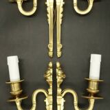 Suite de 4 appliques à 1 feu style Louis XVI du XIXe - bronze doré
