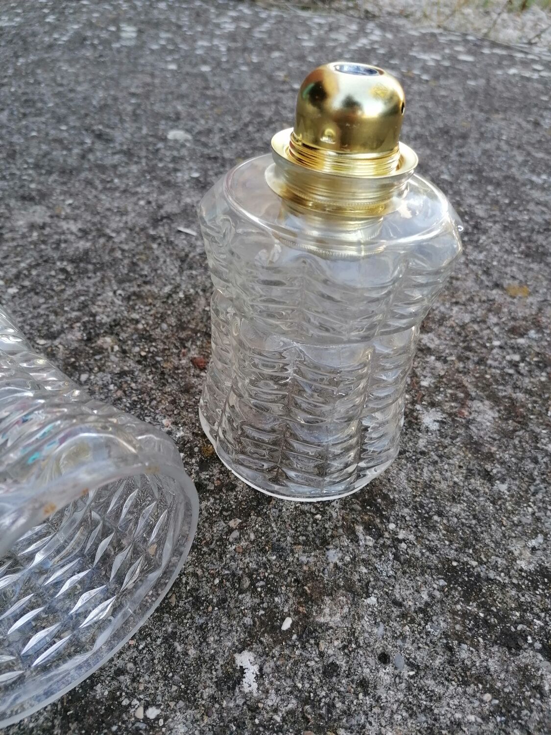 Duo of vintage molded glass globe pendant lights.