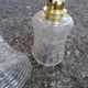 Duo of vintage molded glass globe pendant lights.