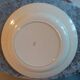 Old round earthenware dish from kg luneville with brown floral decoration