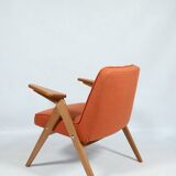 Fauteuil scandinave orange brûlée conclu par Chierowski