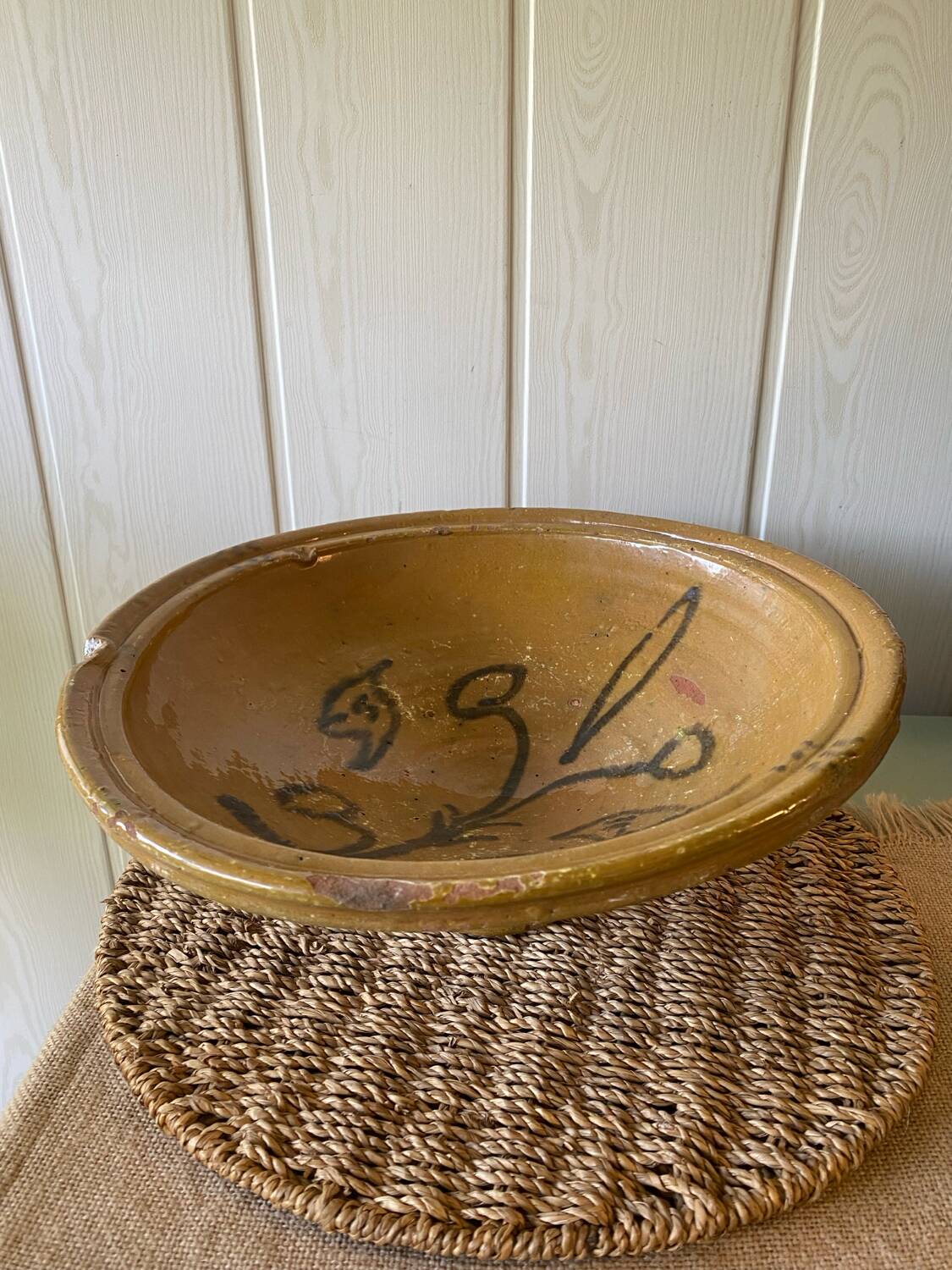 Old glazed terracotta dish