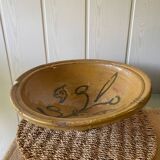 Old glazed terracotta dish