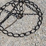 Vintage floor lamp from the 50s in blackened iron in the shape of a chain