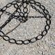 Vintage floor lamp from the 50s in blackened iron in the shape of a chain