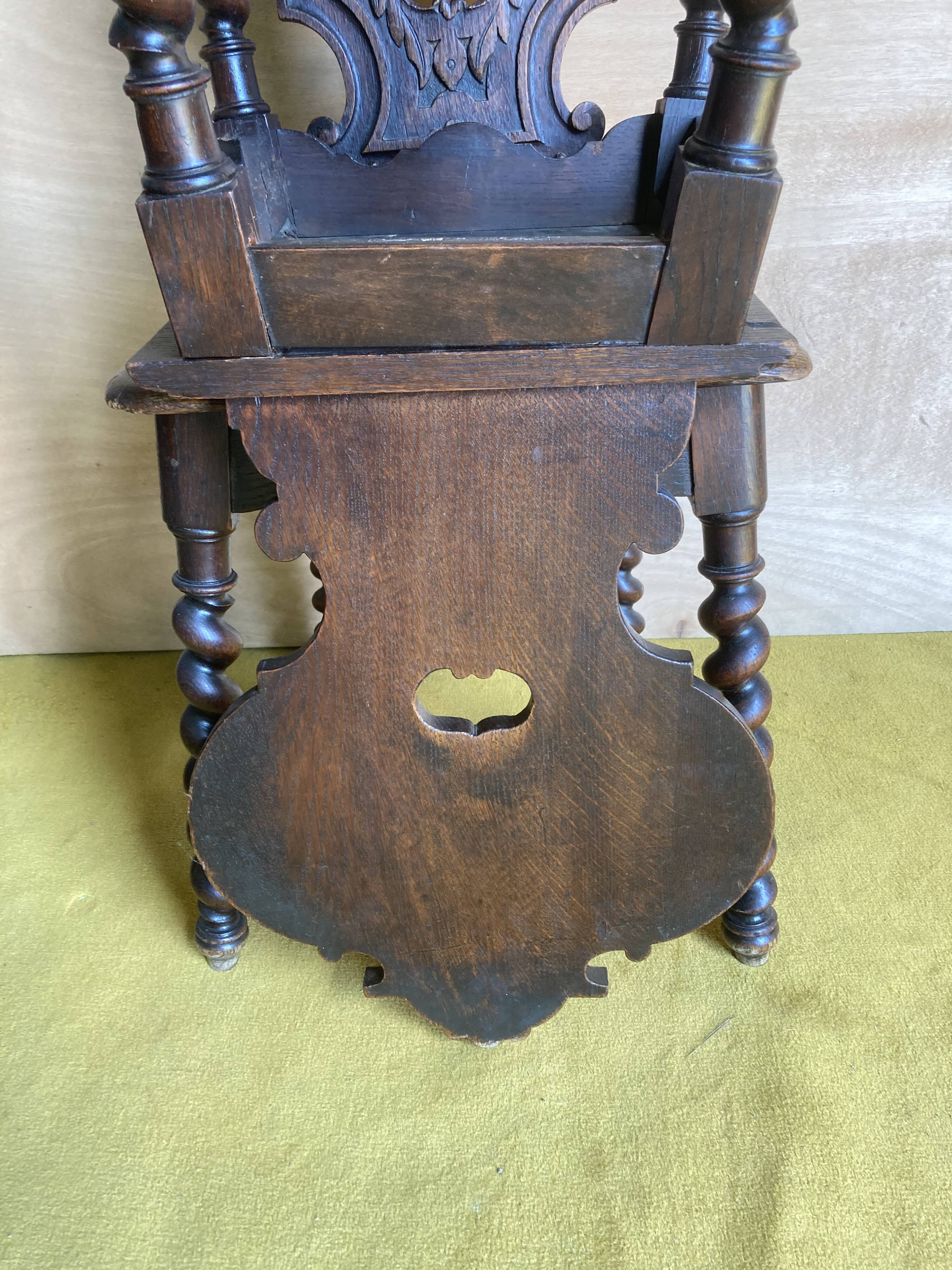 Duo of carved wooden chairs