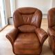 Living room set: 3-seater sofa and 2 brown leather armchairs.