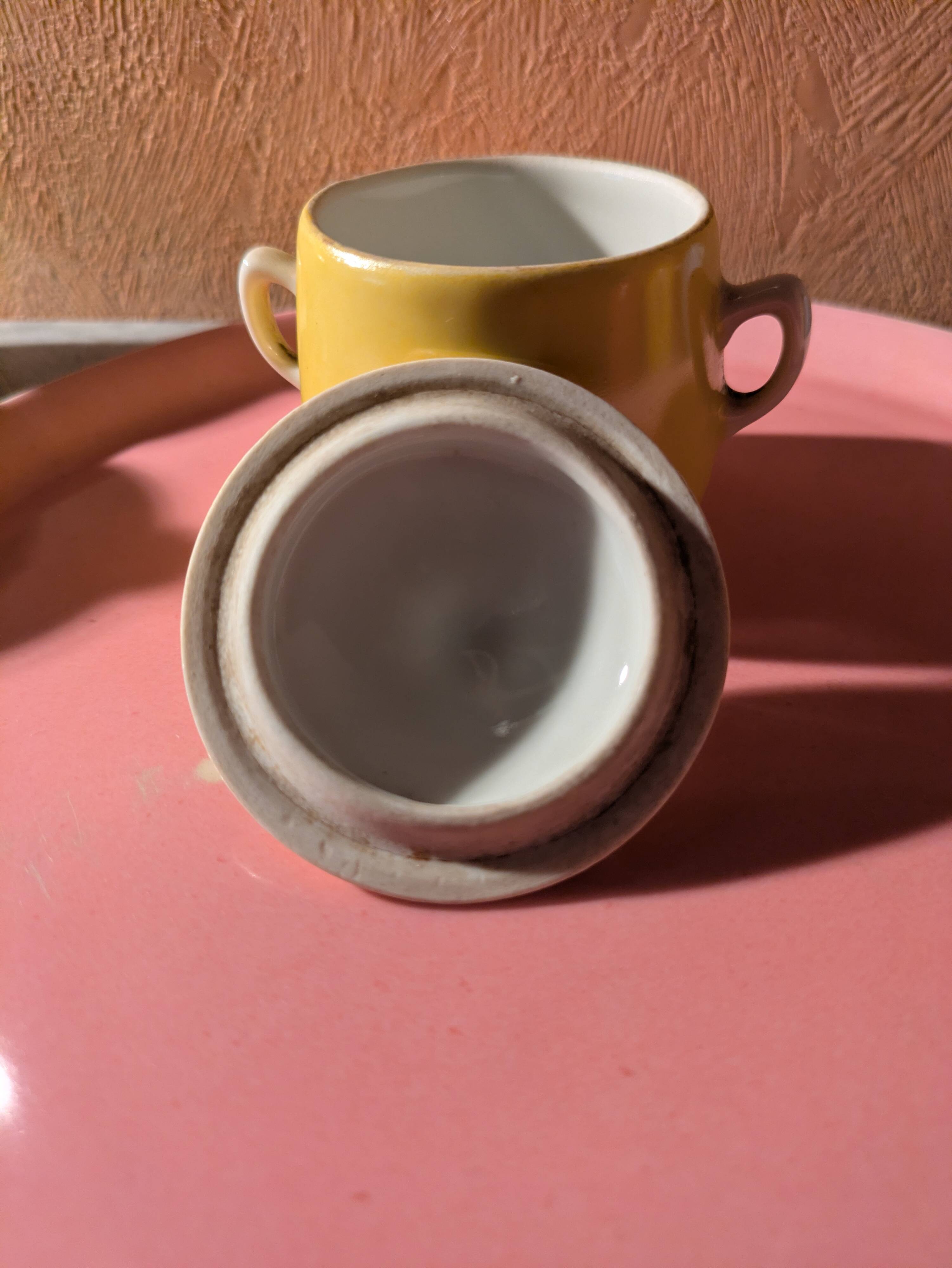 6 small porcelain cream pots from Limoges with a tray.