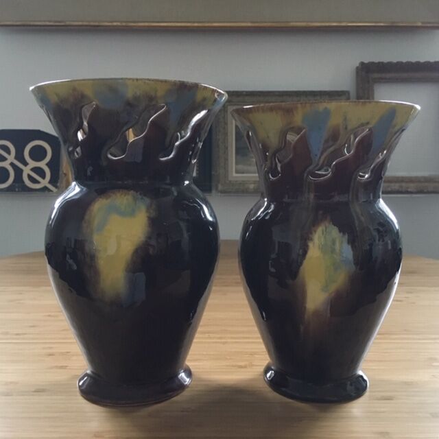 Pair of flaming ceramic vases