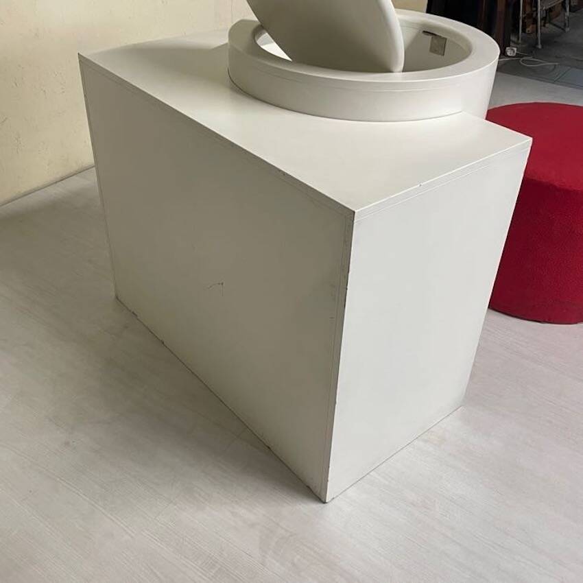 Bathroom toilet with a 70s pouf.
