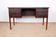 Danish desk in rosewood with teak legs, Johannes Andersen 1960.