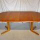 Expandable round table in teak
