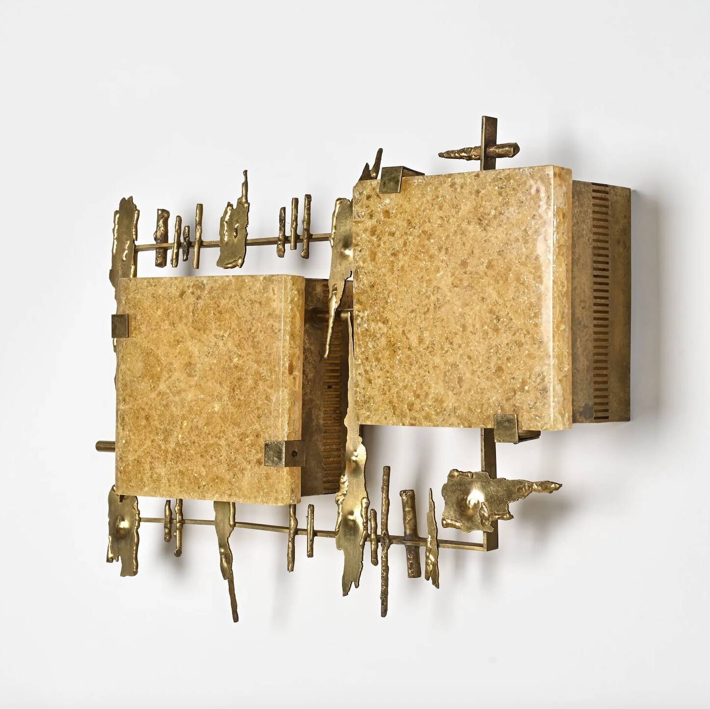 Pair of brutalist wall sconces in brass and fractal resin from the 1970s.