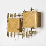 Pair of brutalist wall sconces in brass and fractal resin from the 1970s.
