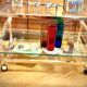 Title: Hollywood Regency chrome & glass side table – 1970s