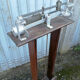 Old scale at pharmacy wood house rongier weighs person