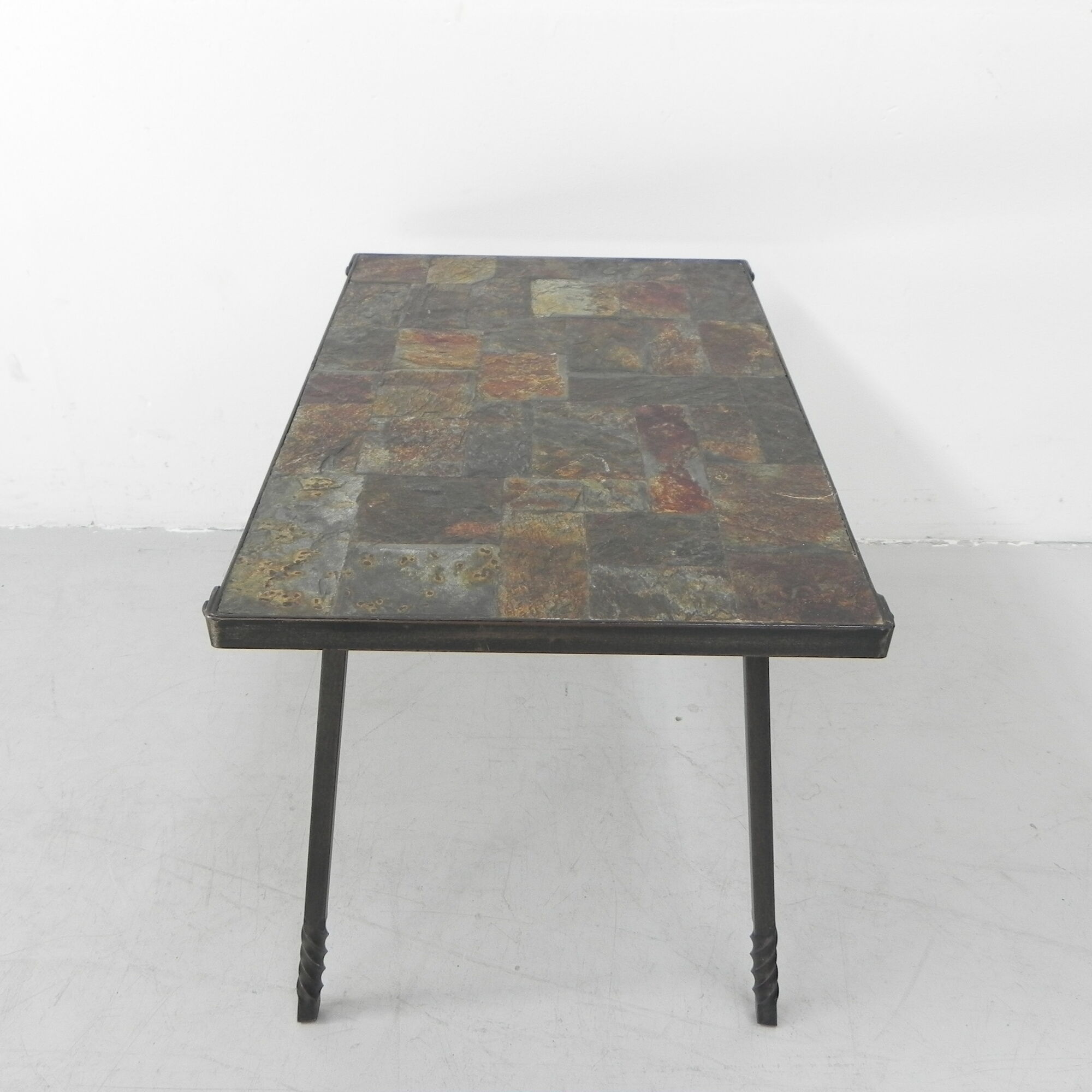 Brutalist coffee table with slate top
