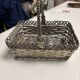 Antique woven metal basket