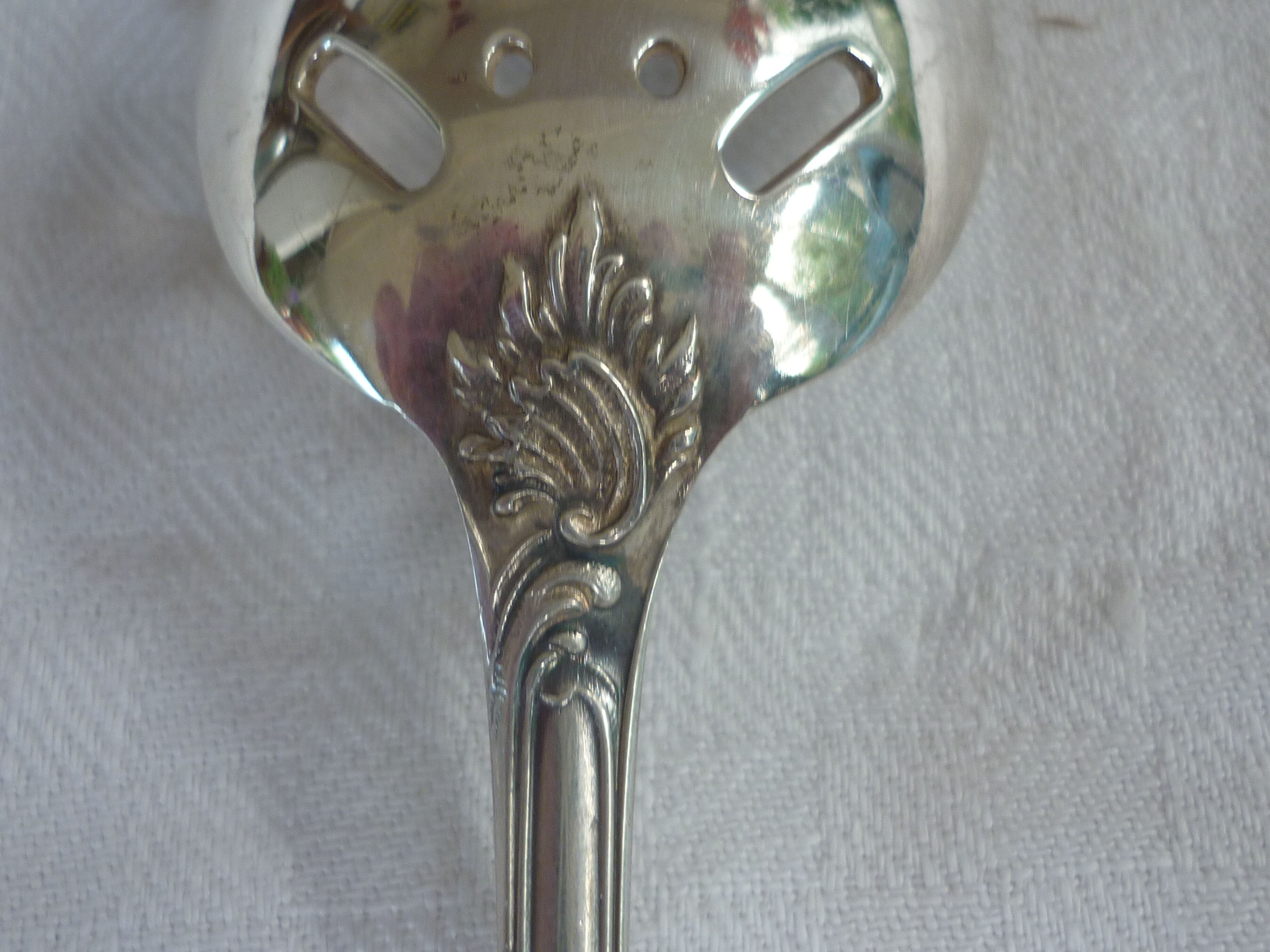 Spoonful with silver metal cubes Christofle