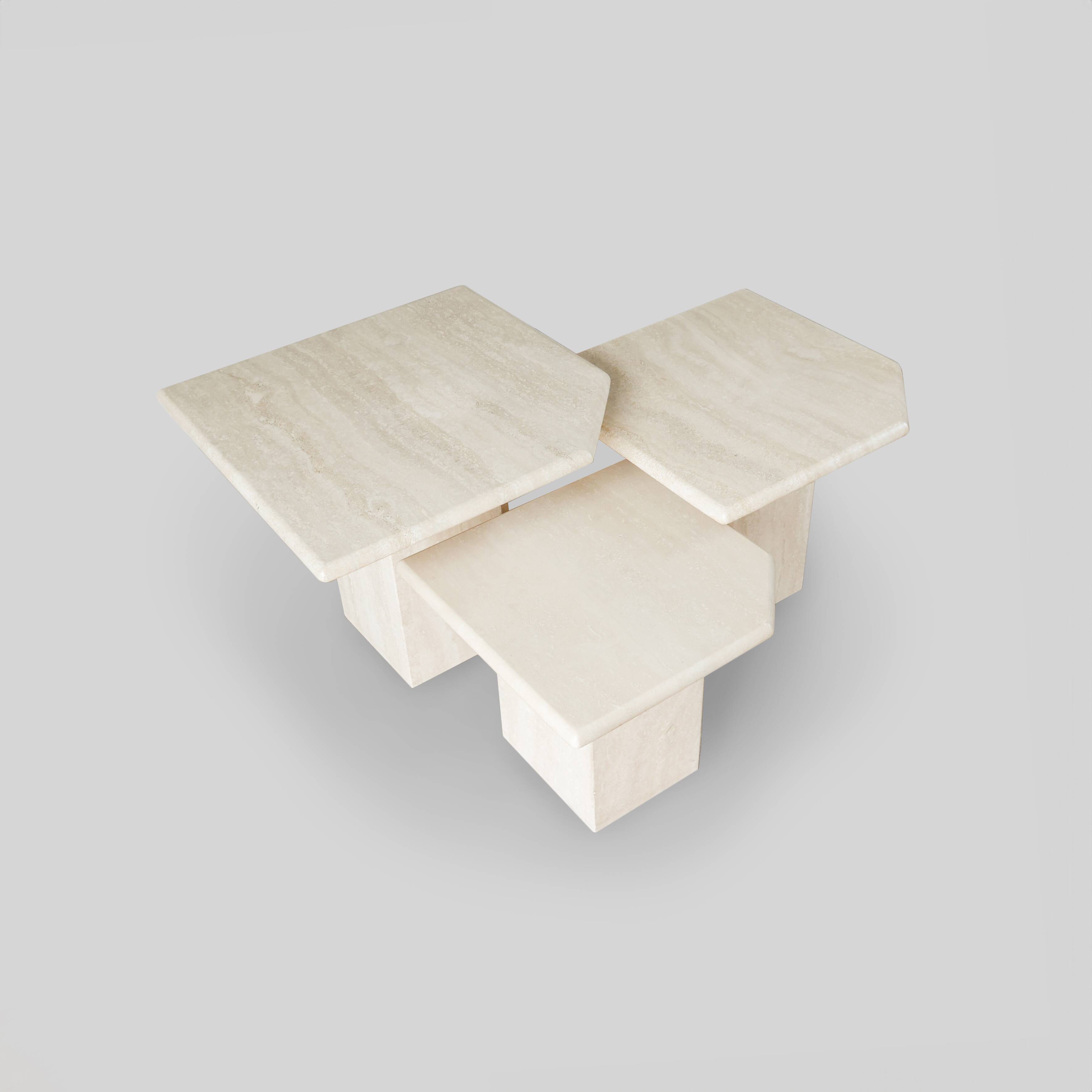 A set of 3 vintage italian travertine nesting tables