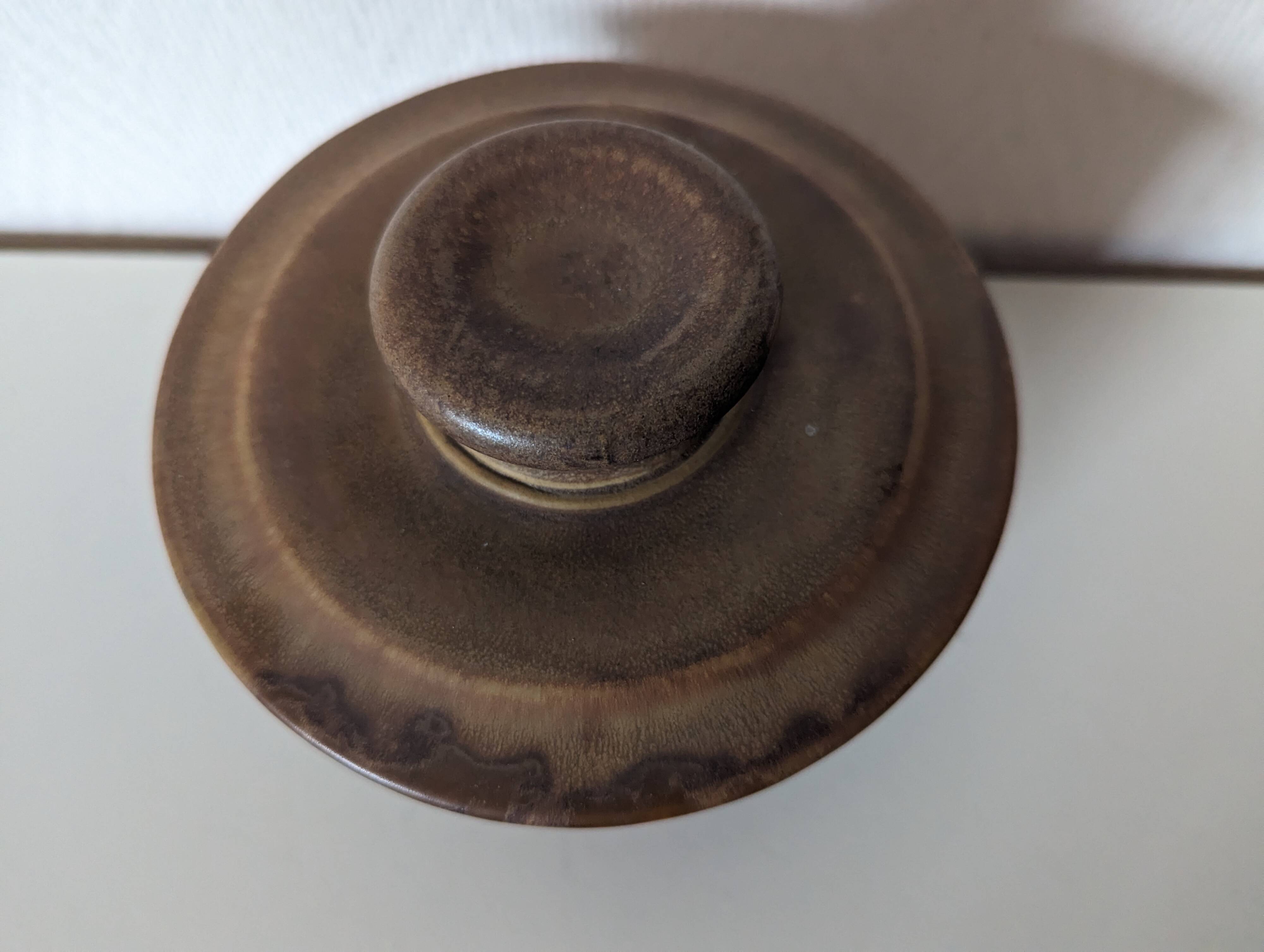 brown stoneware water butter dish