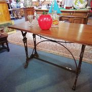 Bistro table over wood cast iron legs
