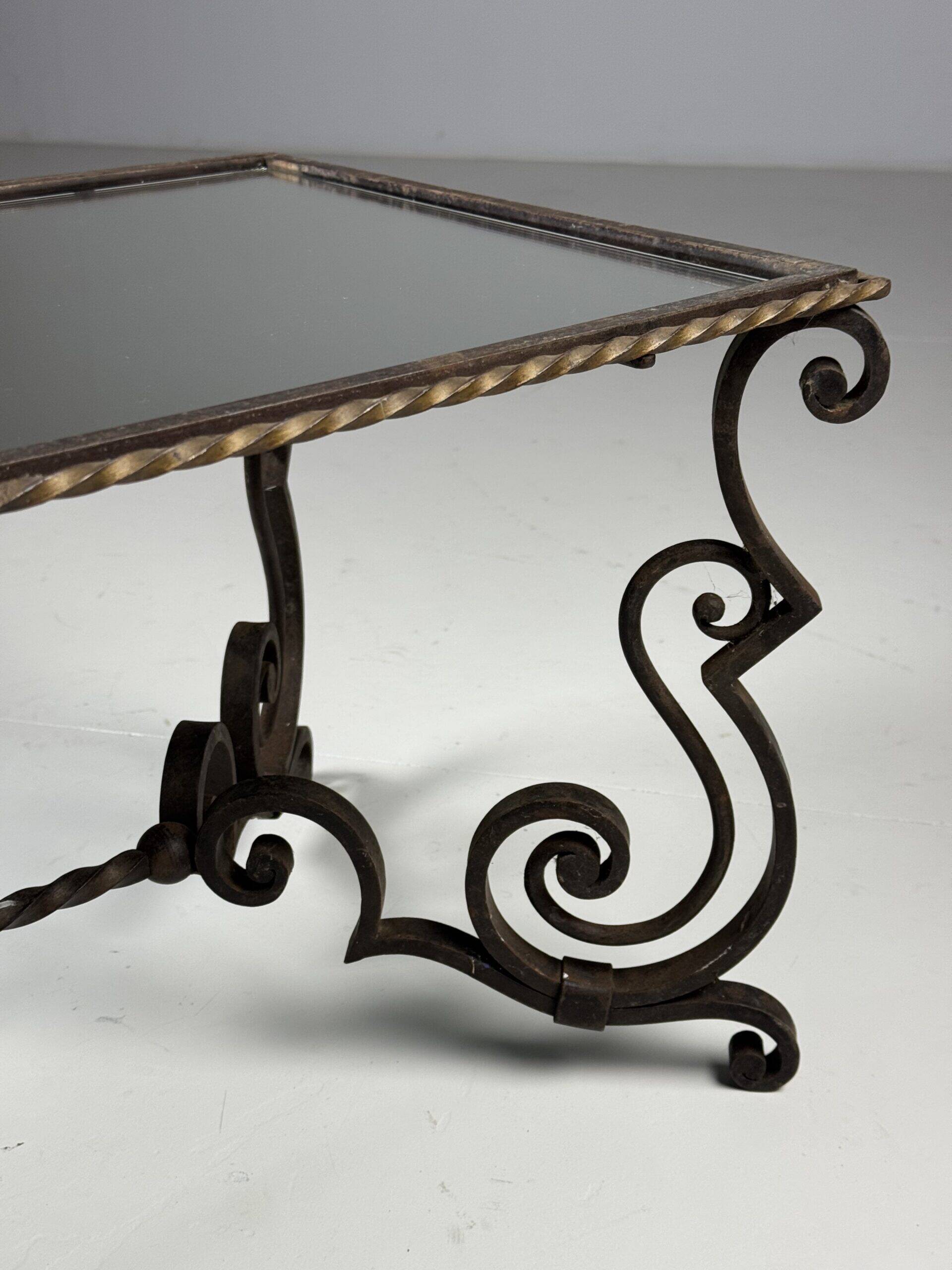 Wrought iron coffee table with mirror glass