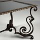 Wrought iron coffee table with mirror glass