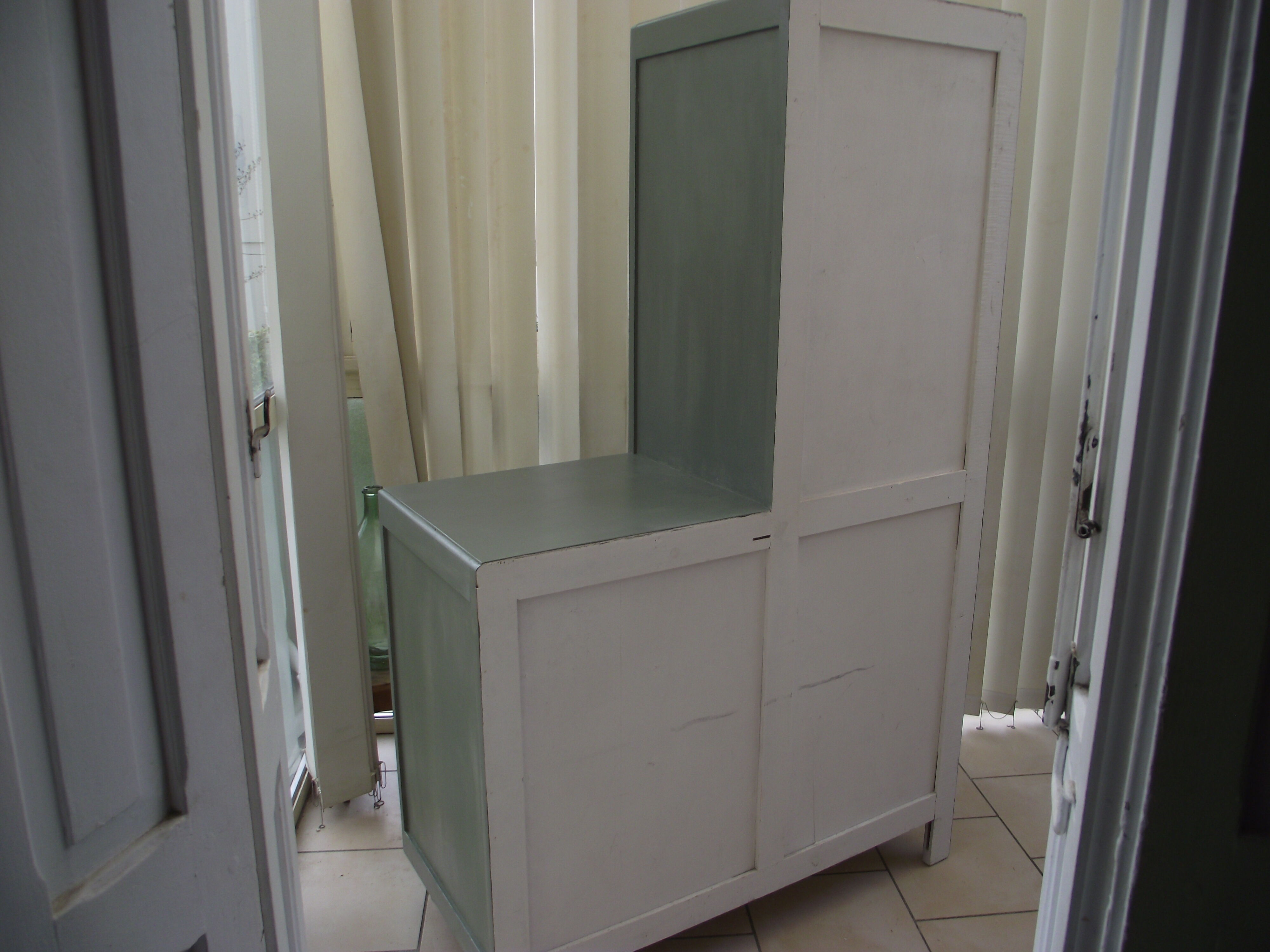 Asymmetrical cabinet from the 50s