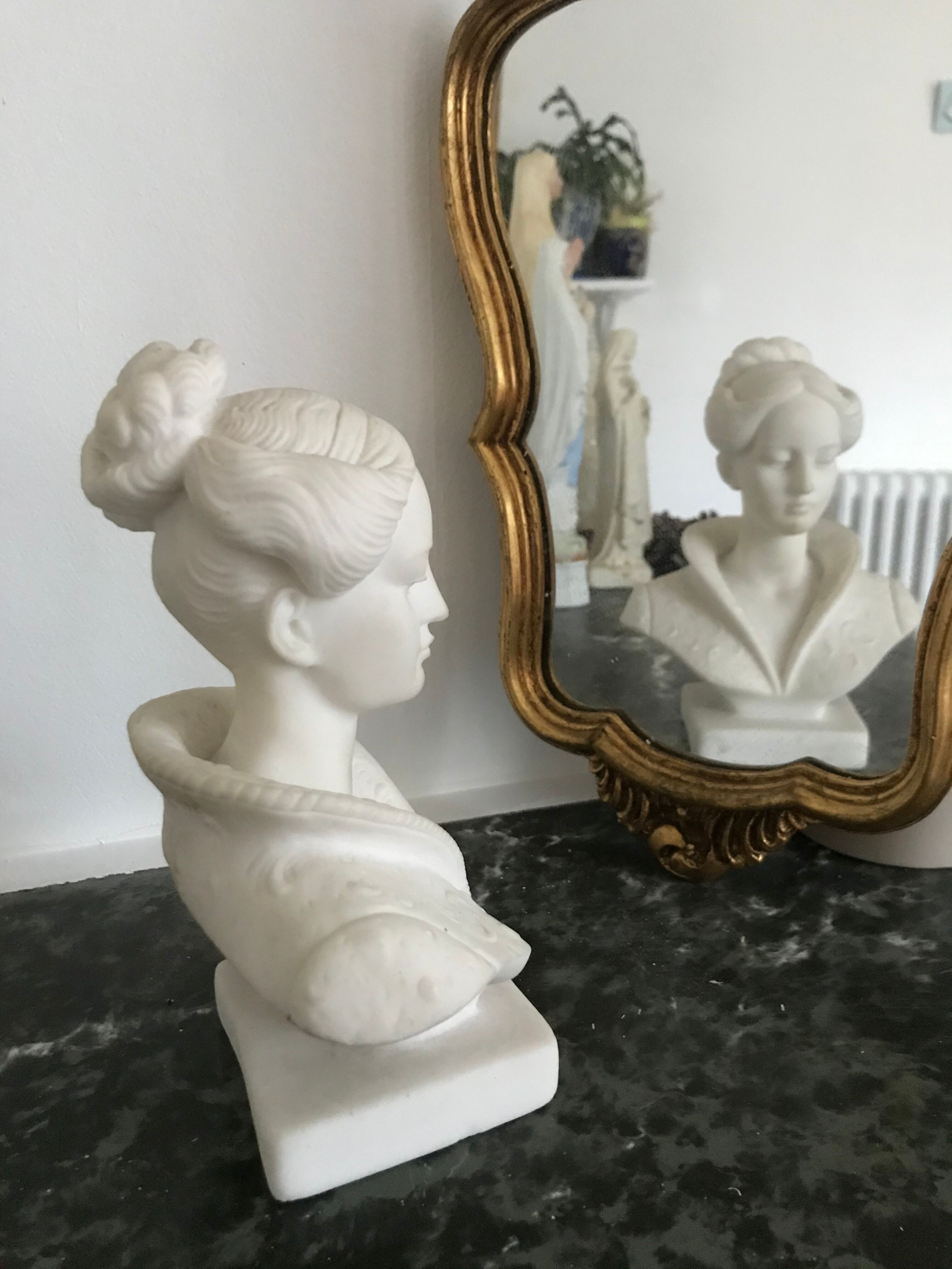 Female bust in plaster